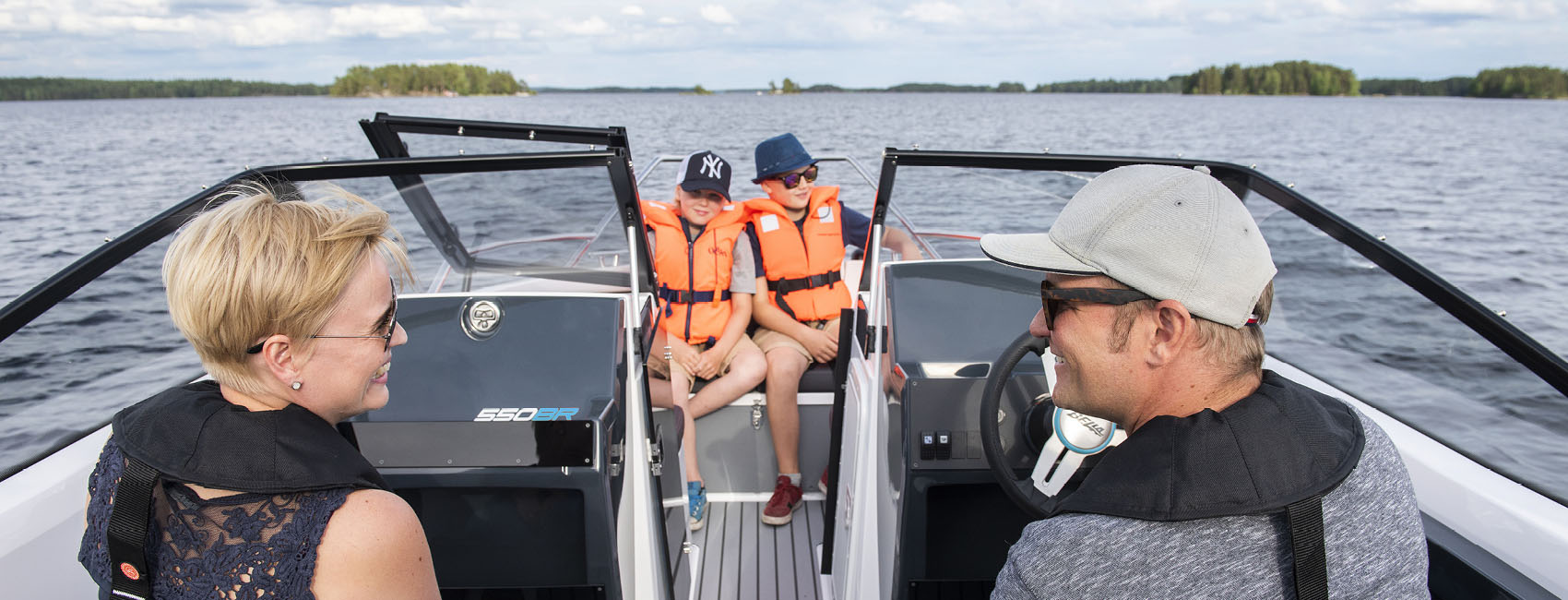 Family in a Bella Boat.